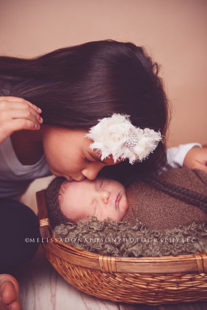 older sibling with baby photography